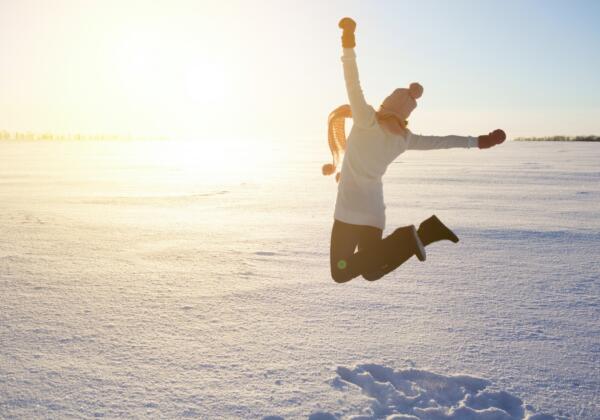 Happy Girl With A Red Scarf On The Winter