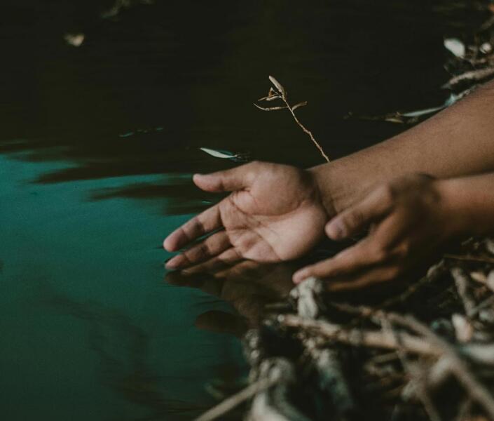 Hand in water