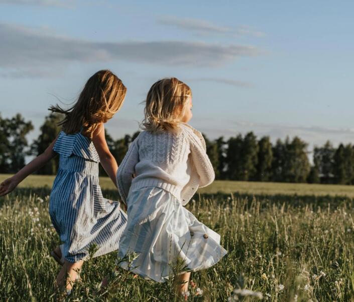 Kids running in grassland