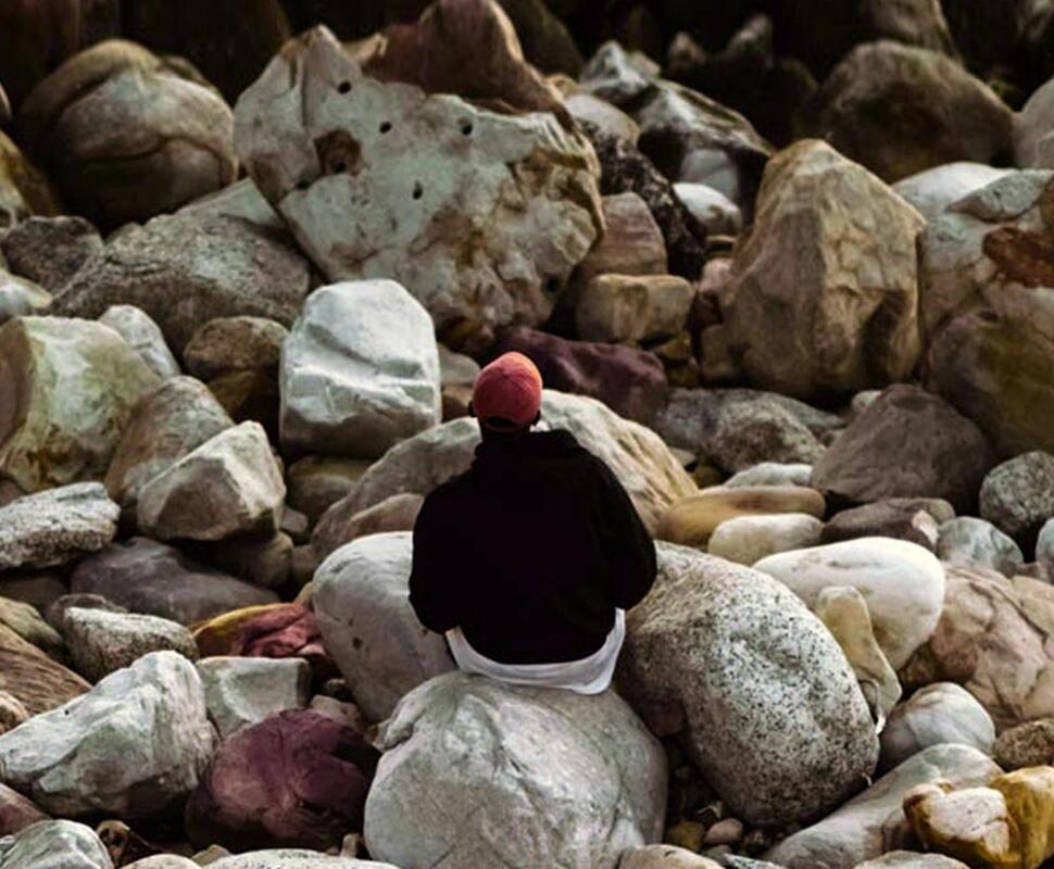 Man sitting on rocks
